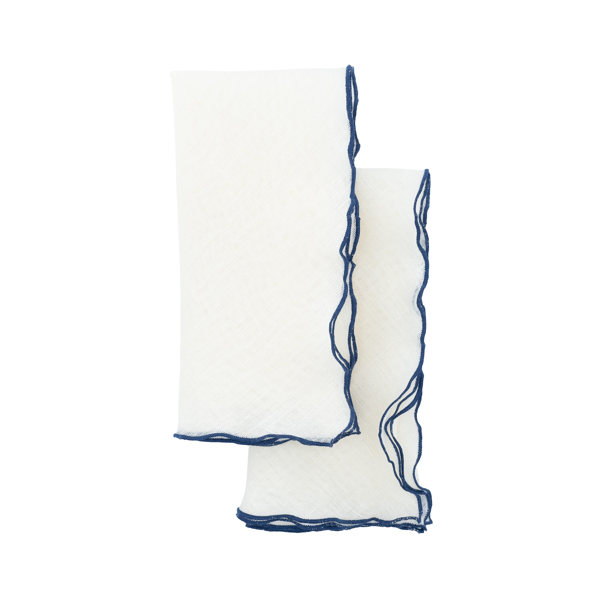 Handmade linen napkins with navy ruffled edges, ideal for both casual family dinners and formal gatherings.