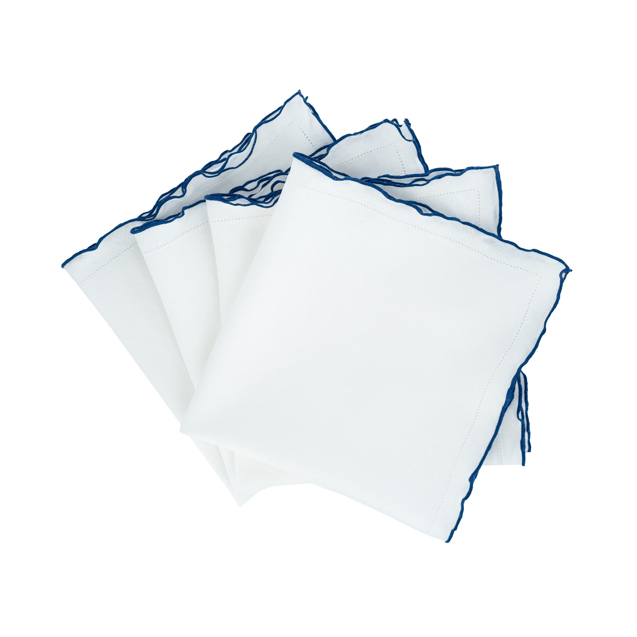 Handmade white linen napkins with decorative navy ruffled hemstitch edges, ideal for both formal and casual gatherings.