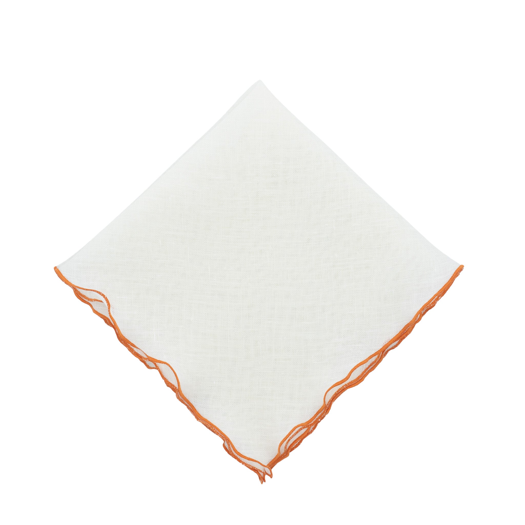 Close-up of orange ruffled edge napkin made from 100% linen, adding a pop of color to any dining setting.