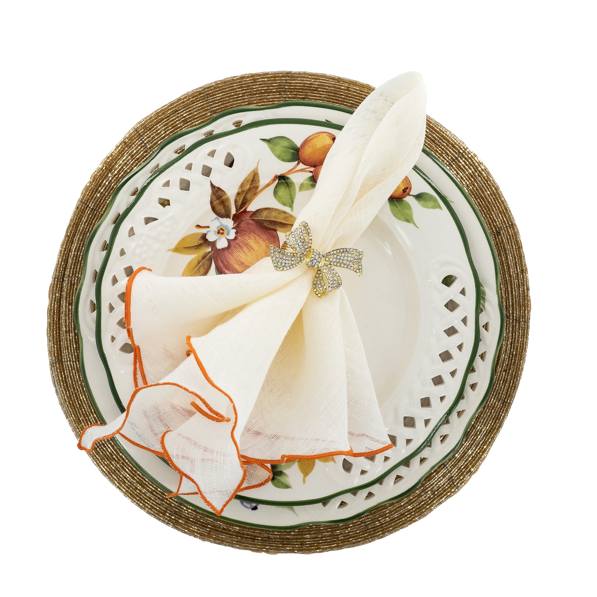 Elegant linen napkins with bright orange ruffled edges, handmade for long-lasting quality and texture.