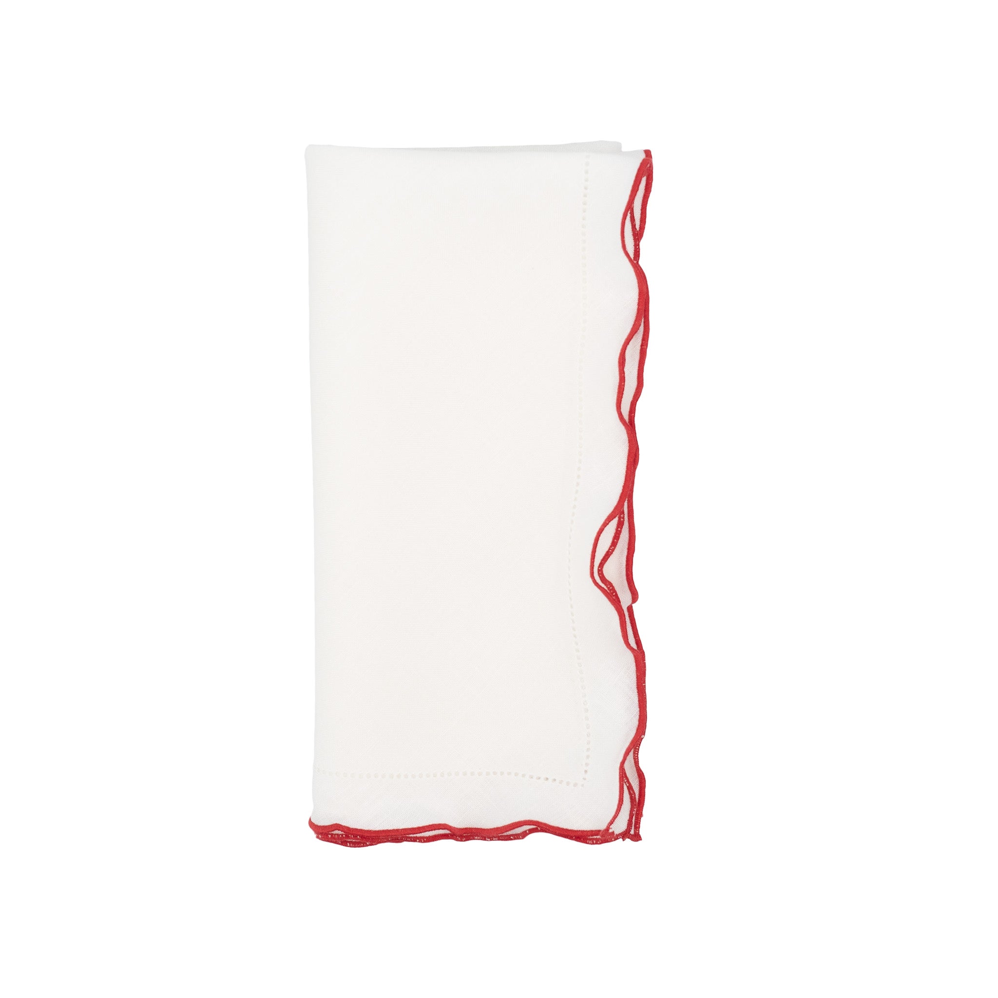 White linen napkins with red ruffled hemstitch edges, crafted to bring a festive and elegant feel to your table settings.