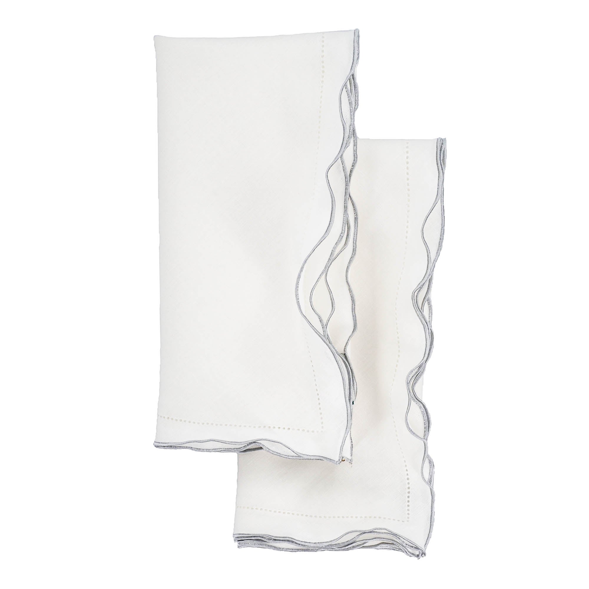 Luxurious white linen napkins with silver ruffled hemstitching, designed to enhance your dining experience.