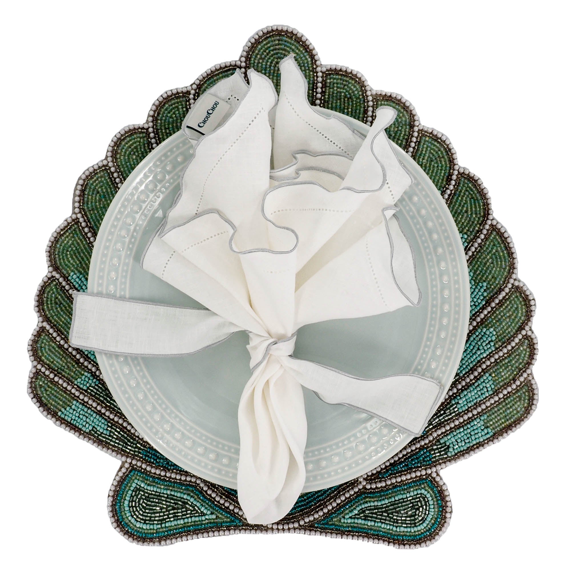 White linen napkins with silver ruffled hemstitch edges, crafted to bring a touch of luxury to your table settings.