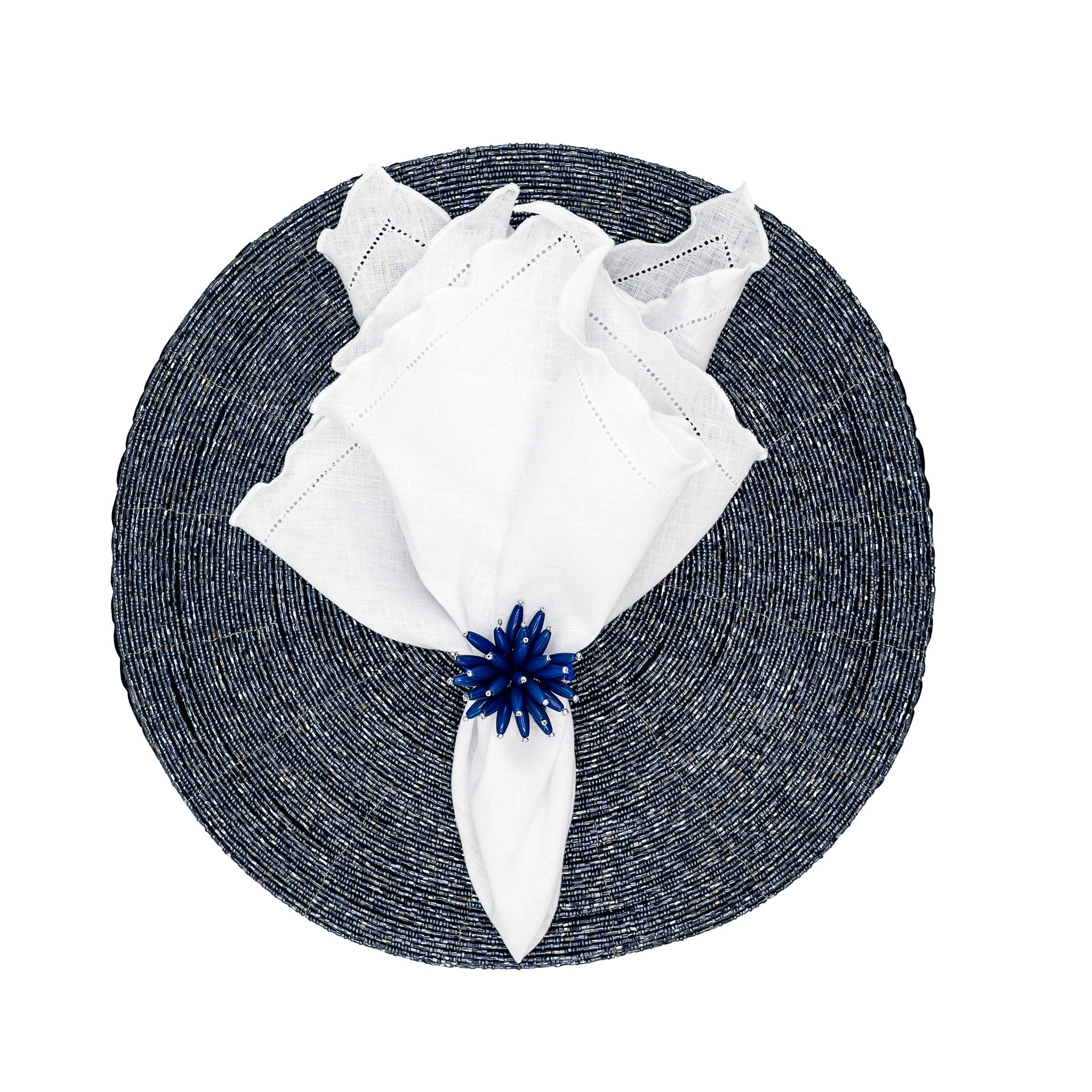 Chouchou Touch handmade linen napkins with white ruffled hemstitch edges, perfect for enhancing any dining occasion.