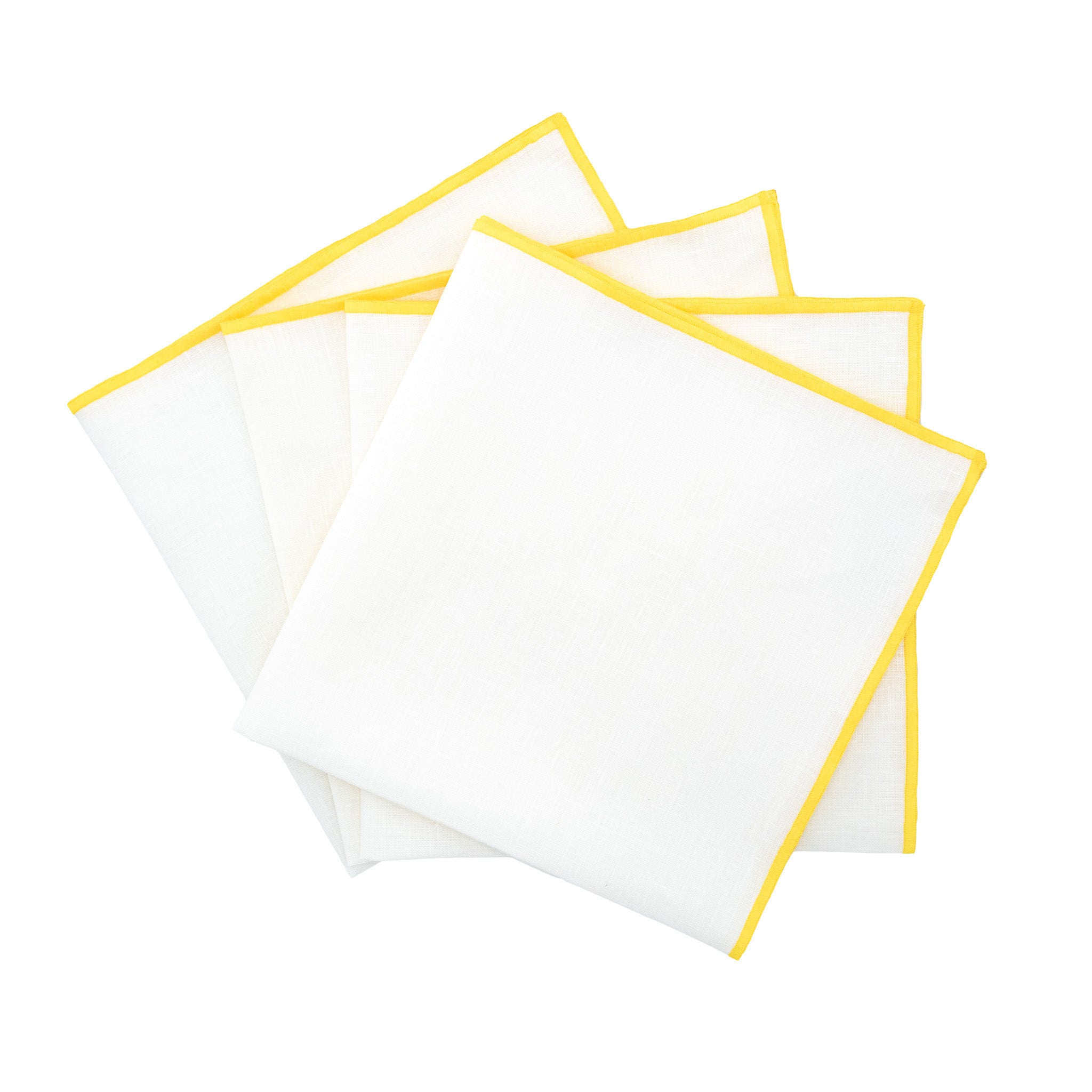 Set of 4 linen napkins with yellow satin stitch edges, handmade for a vibrant and stylish table setting.