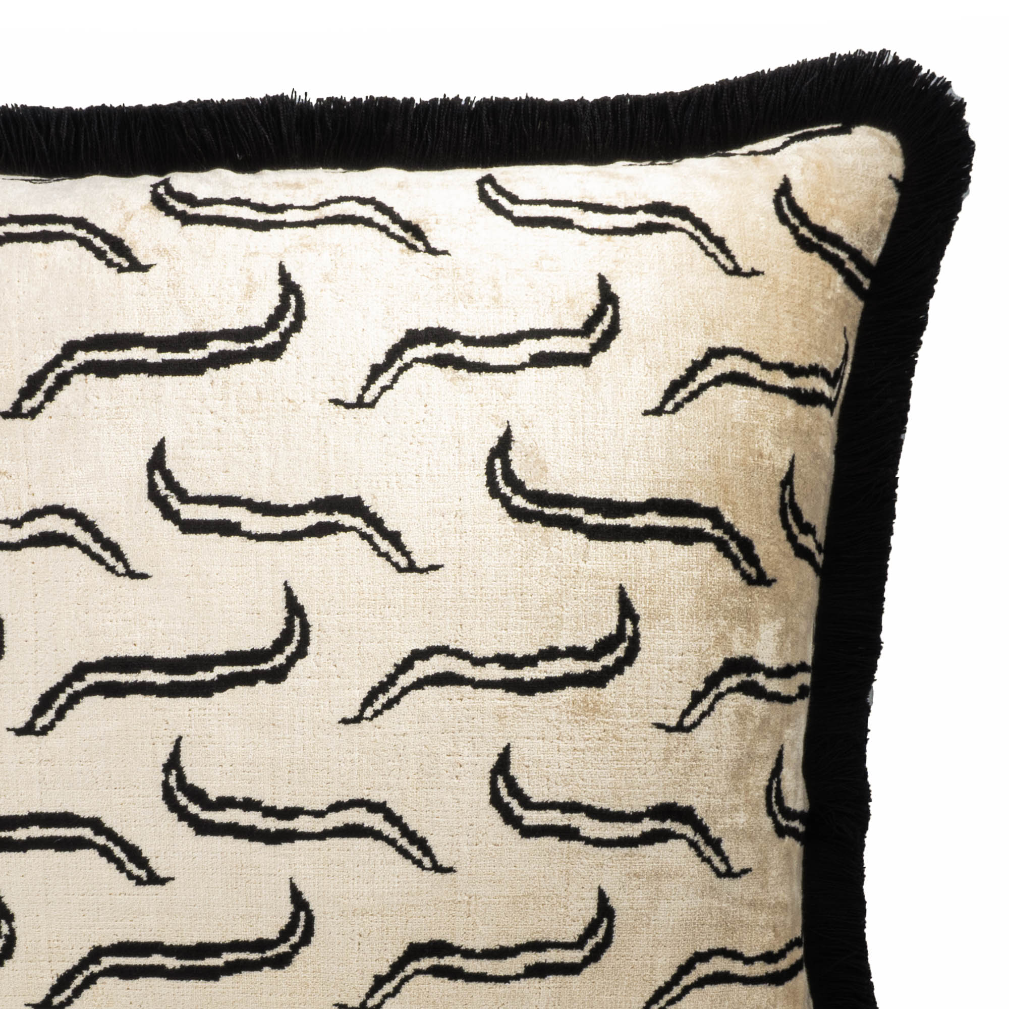 Double-sided black and white silk velvet throw pillow with handmade fringes for a sophisticated touch.
