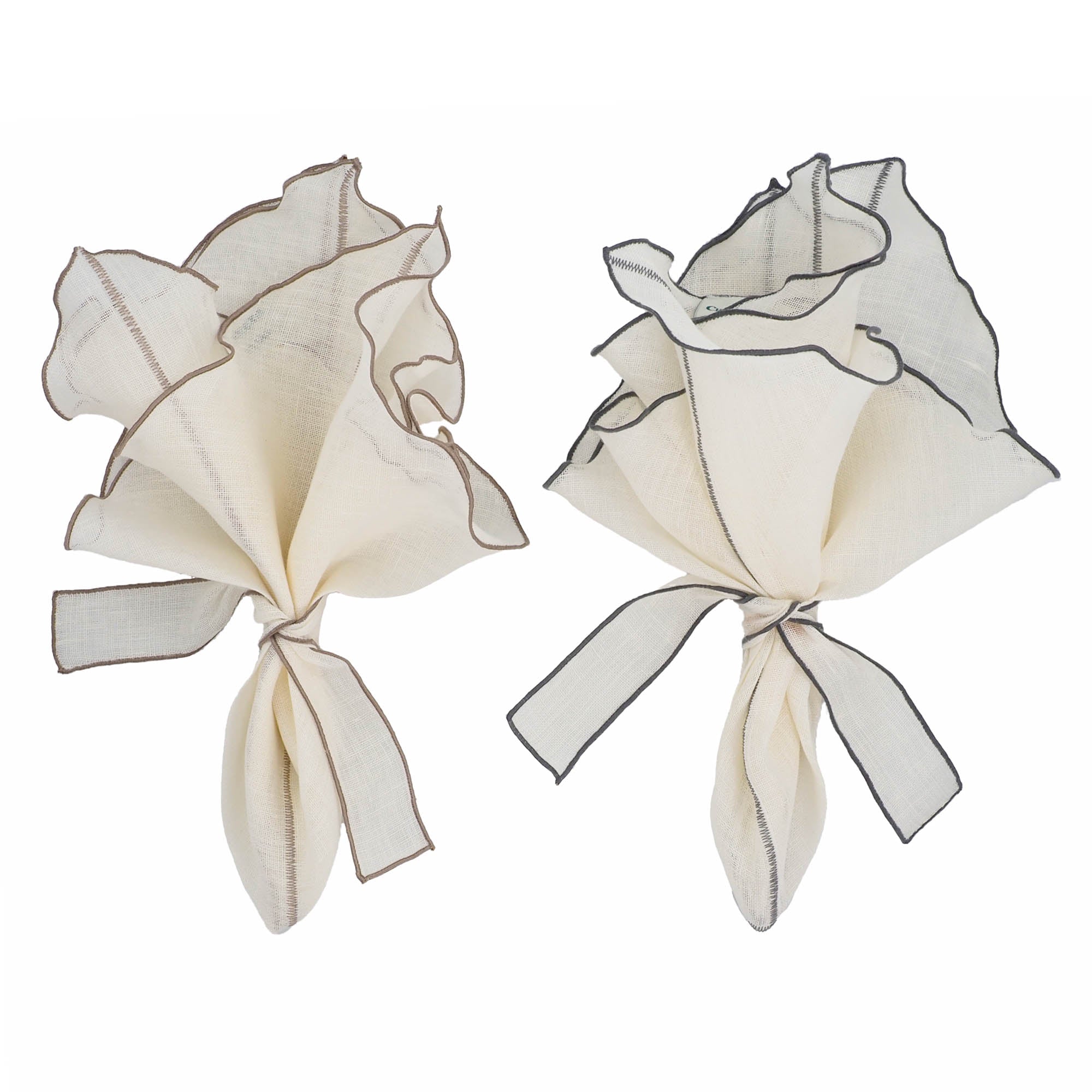 Chouchou Touch Milano linen napkins with charcoal ruffled edges, designed for both casual gatherings and formal dinners.