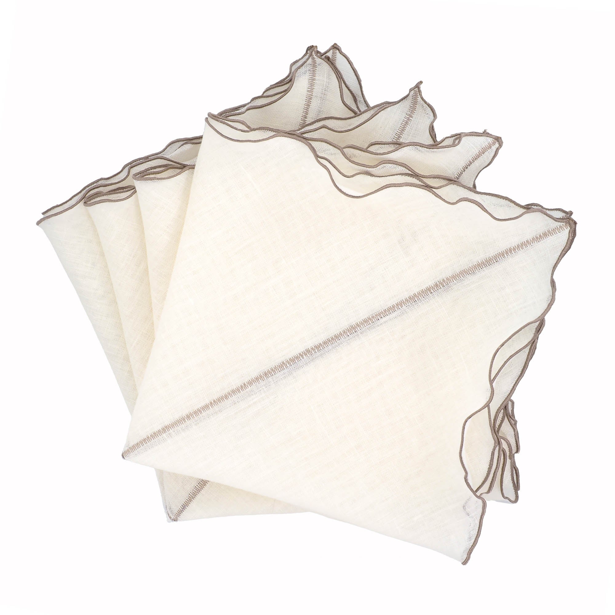 Set of 4 Milano linen napkins with khaki ruffled edges, handmade for a luxurious and romantic table setting.