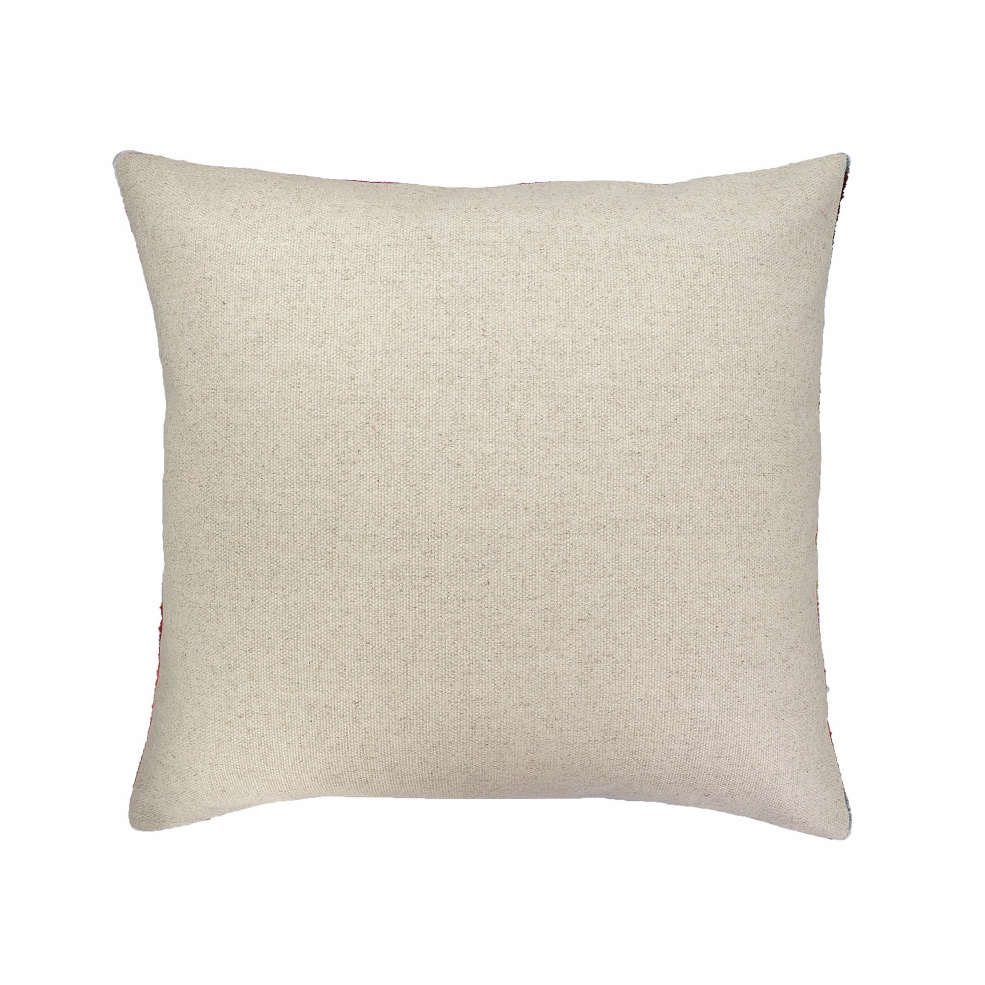 Back view of orange silk velvet ikat pillow cover featuring a natural linen backing and concealed zipper closure.