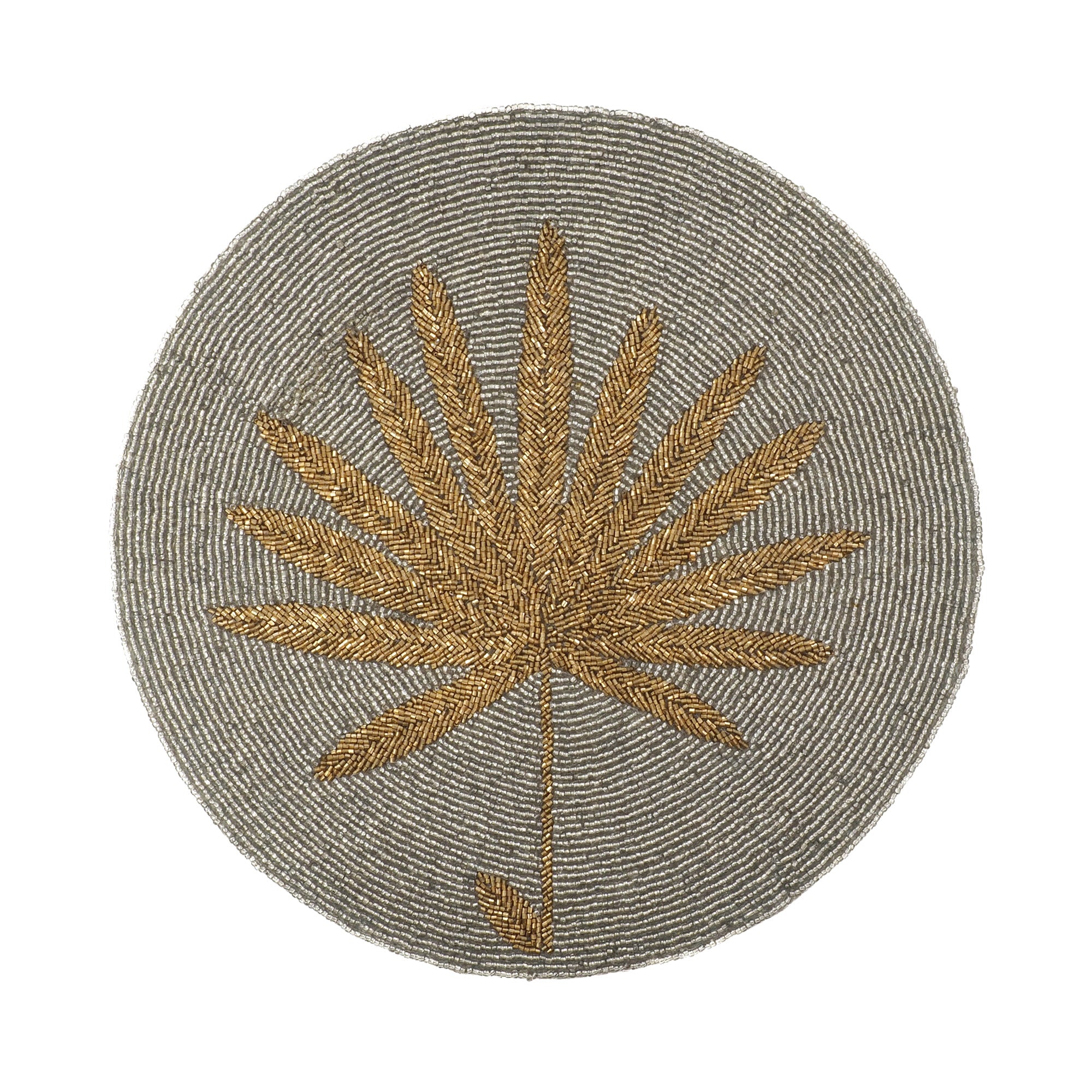 Handmade palm leaf design placemat adorned with beige and gold glass beads on  a white background by ChouChou Touch