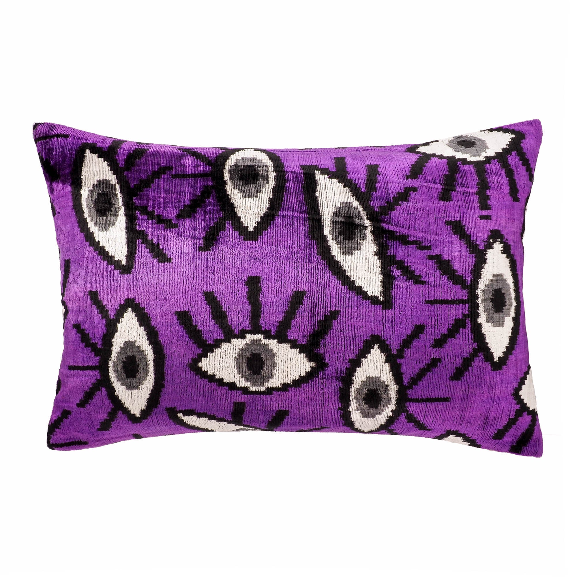 Chouchou Touch Purple Eyes Silk Velvet Ikat Pillow Cover, 16 x 24, designed with deep purple Ikat patterns on luxurious silk velvet, bringing a pop of color to your living room.