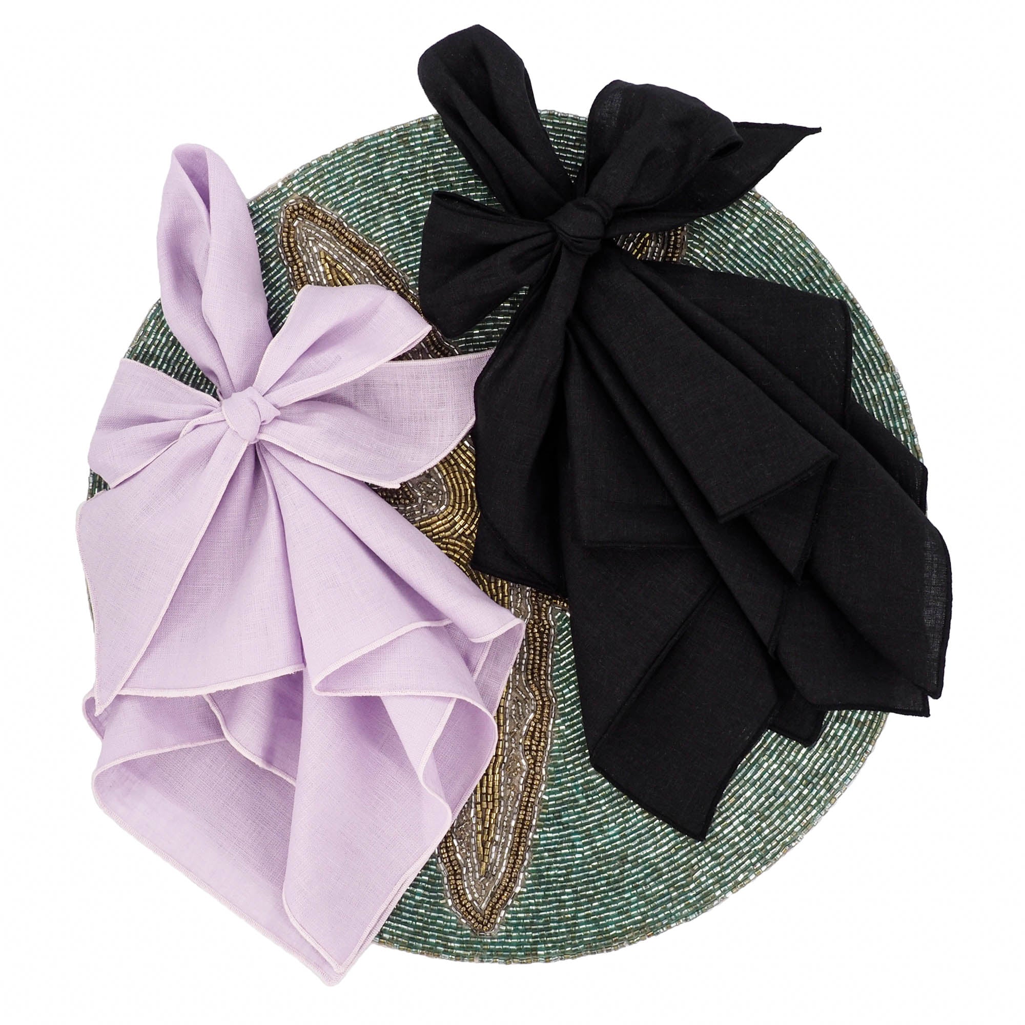 luxury purple linen napkin for luxury dining table on a starfish beaded placemat