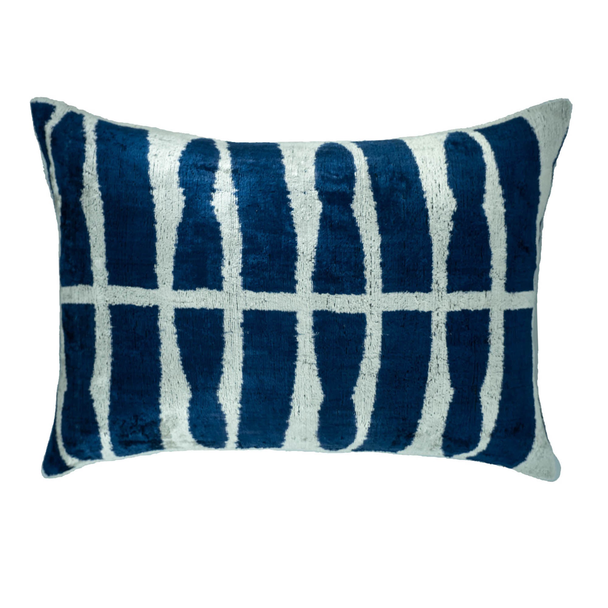 Luxurious Reflections Ikat pillow cover crafted from 100% silk velvet, showcasing bold navy and white grid patterns.
