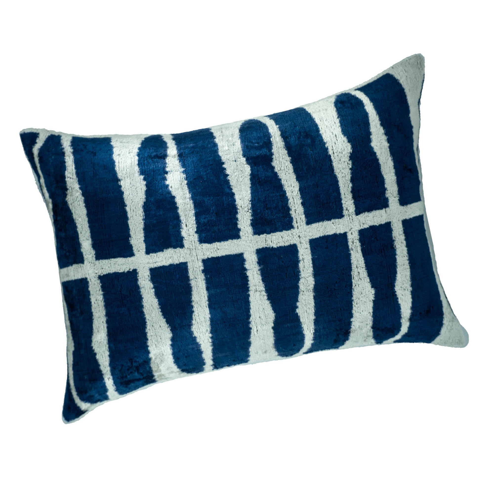 Handwoven silk velvet throw pillow with a geometric blue and white design, measuring 16" x 24".
