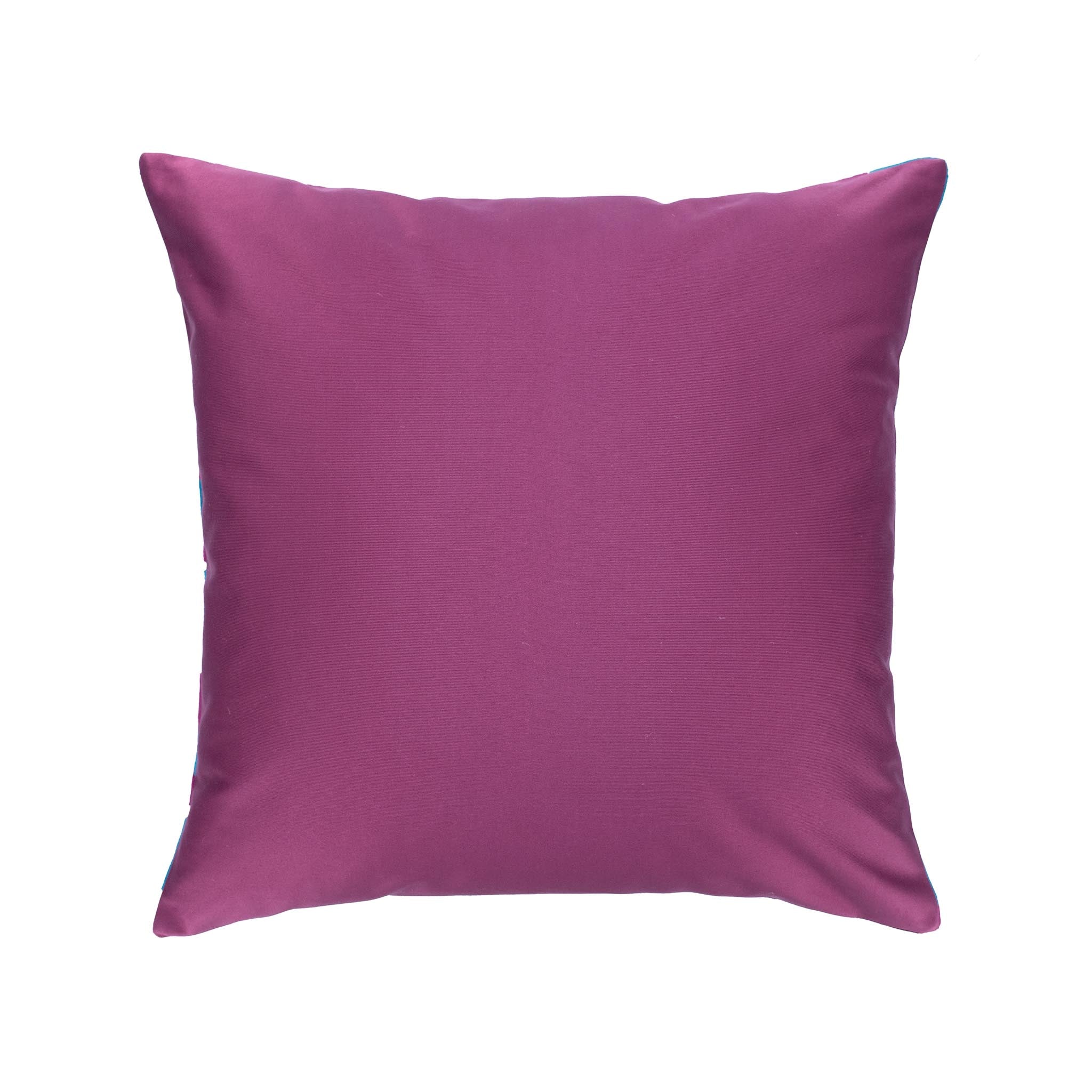 Hand-dyed silk velvet ikat pillow with deep purple blossoms and turquoise details for a rich aesthetic