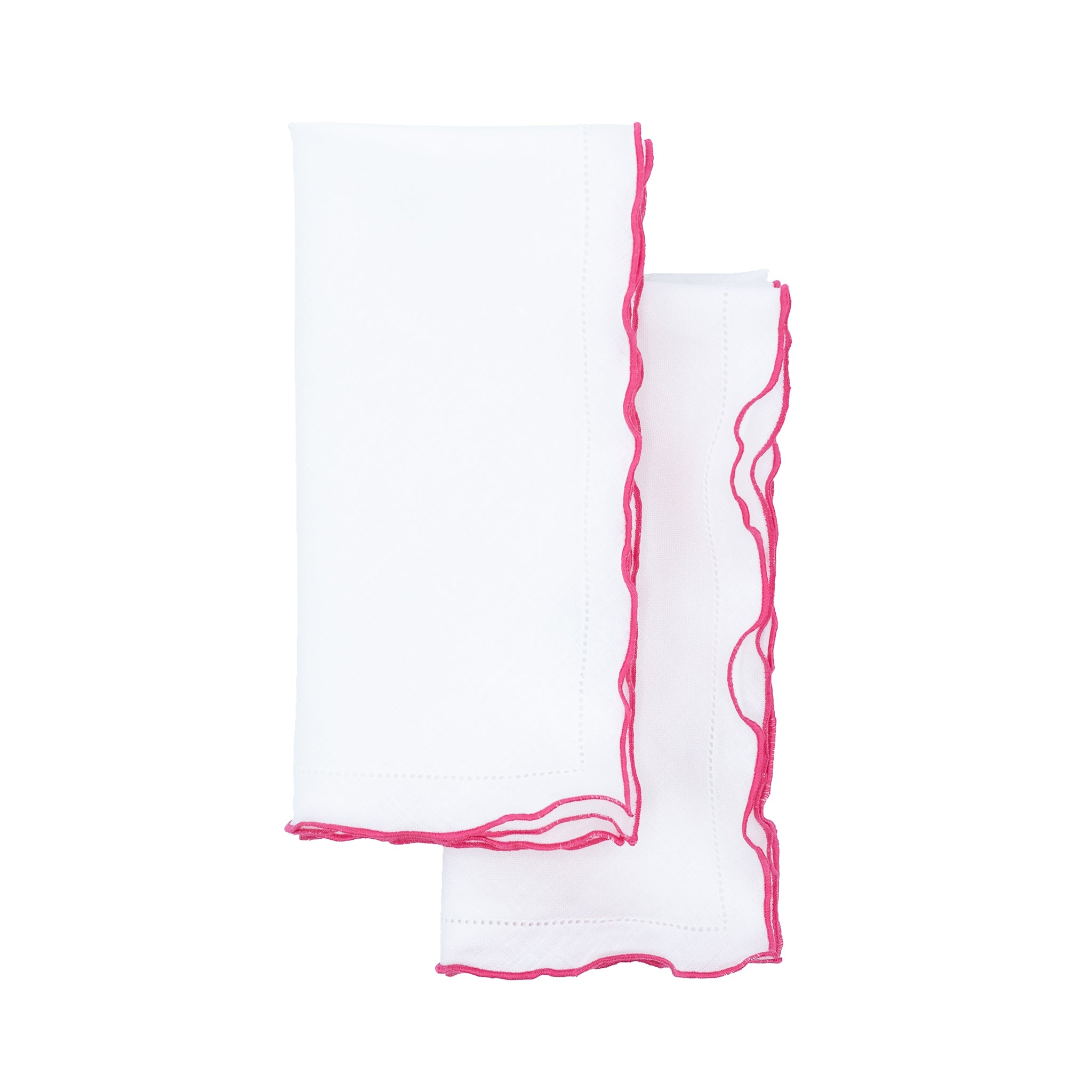 White linen napkins with pink ruffled hemstitch edges, crafted to bring a delicate and sophisticated touch to your table settings.