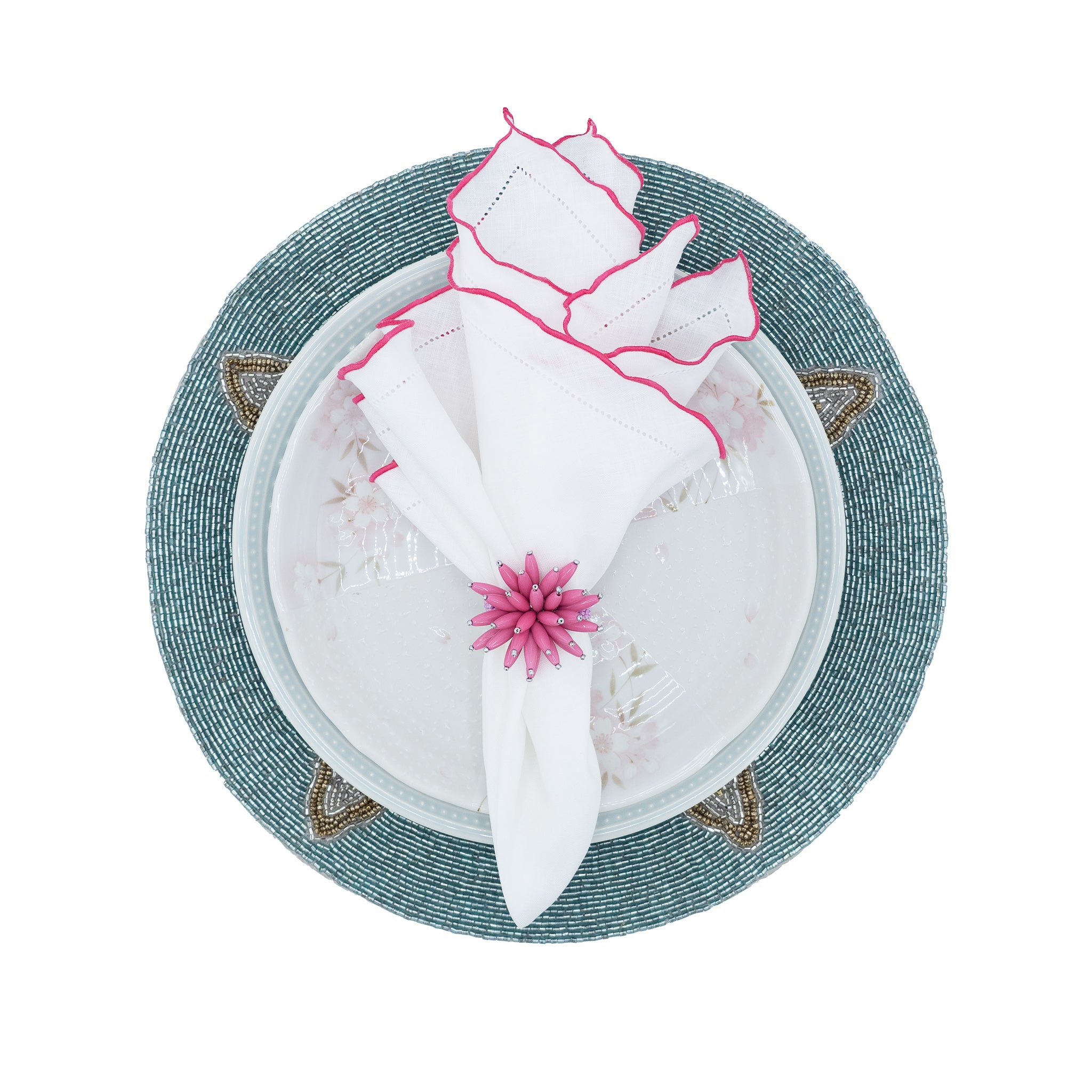 Chouchou Touch handmade white linen napkins with pink ruffled hemstitch edges, perfect for enhancing special occasions and everyday meals.