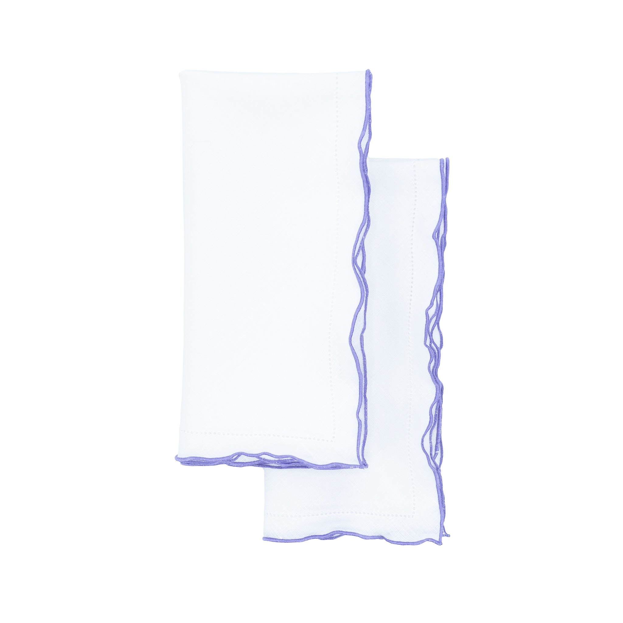 White linen napkins with purple ruffled hemstitch edges, crafted to bring a cheerful and elegant touch to your table settings