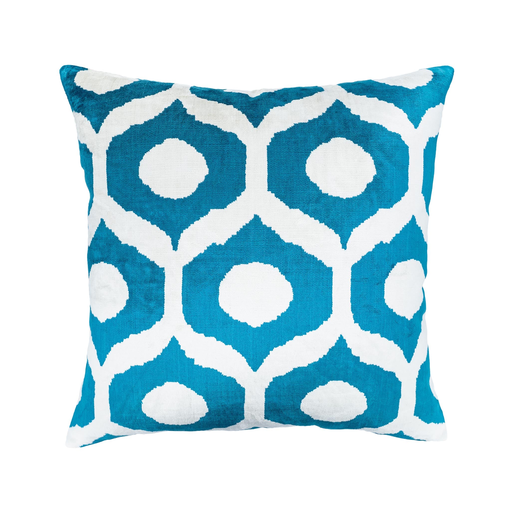 Handwoven ikat pillow featuring a striking blue and white design inspired by Santorini's classic hues.