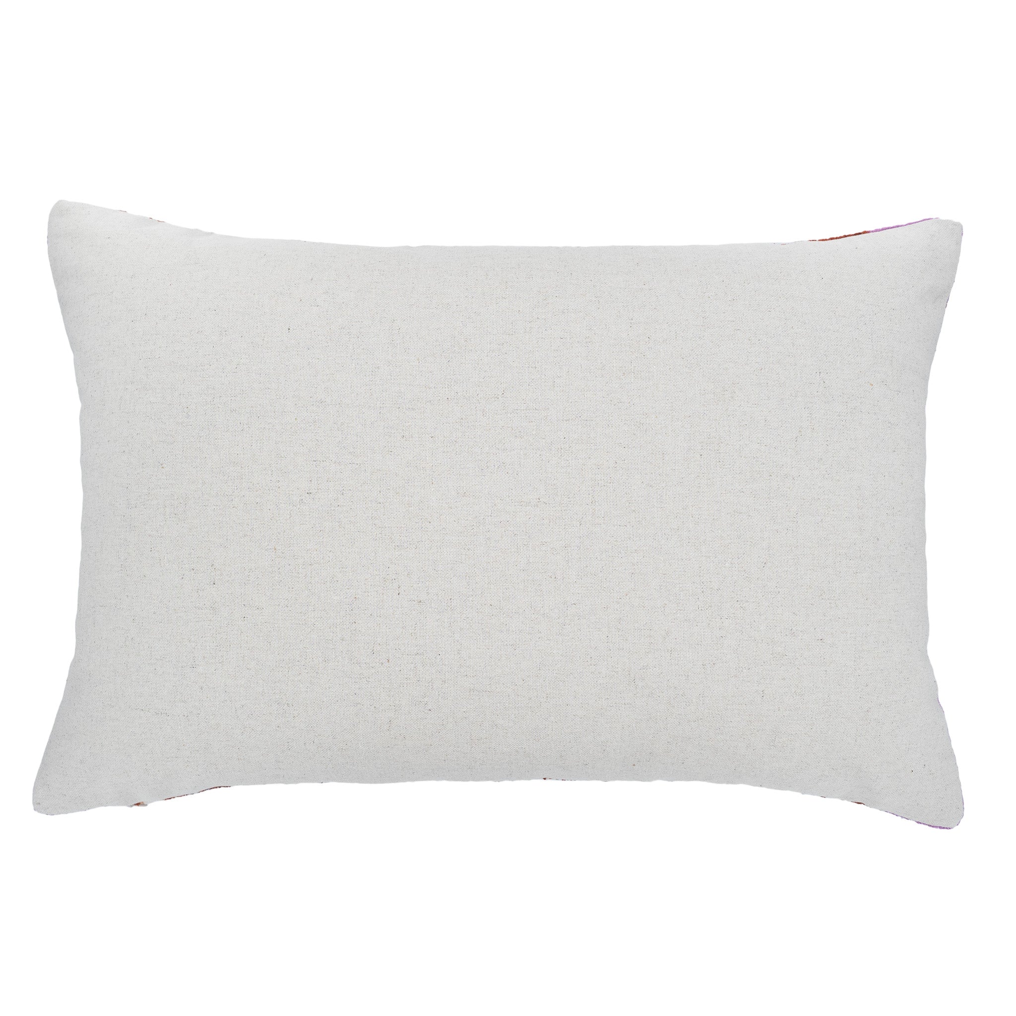 Back view of a handmade blue silk velvet ikat pillow cover with natural linen backing and concealed zipper closure.