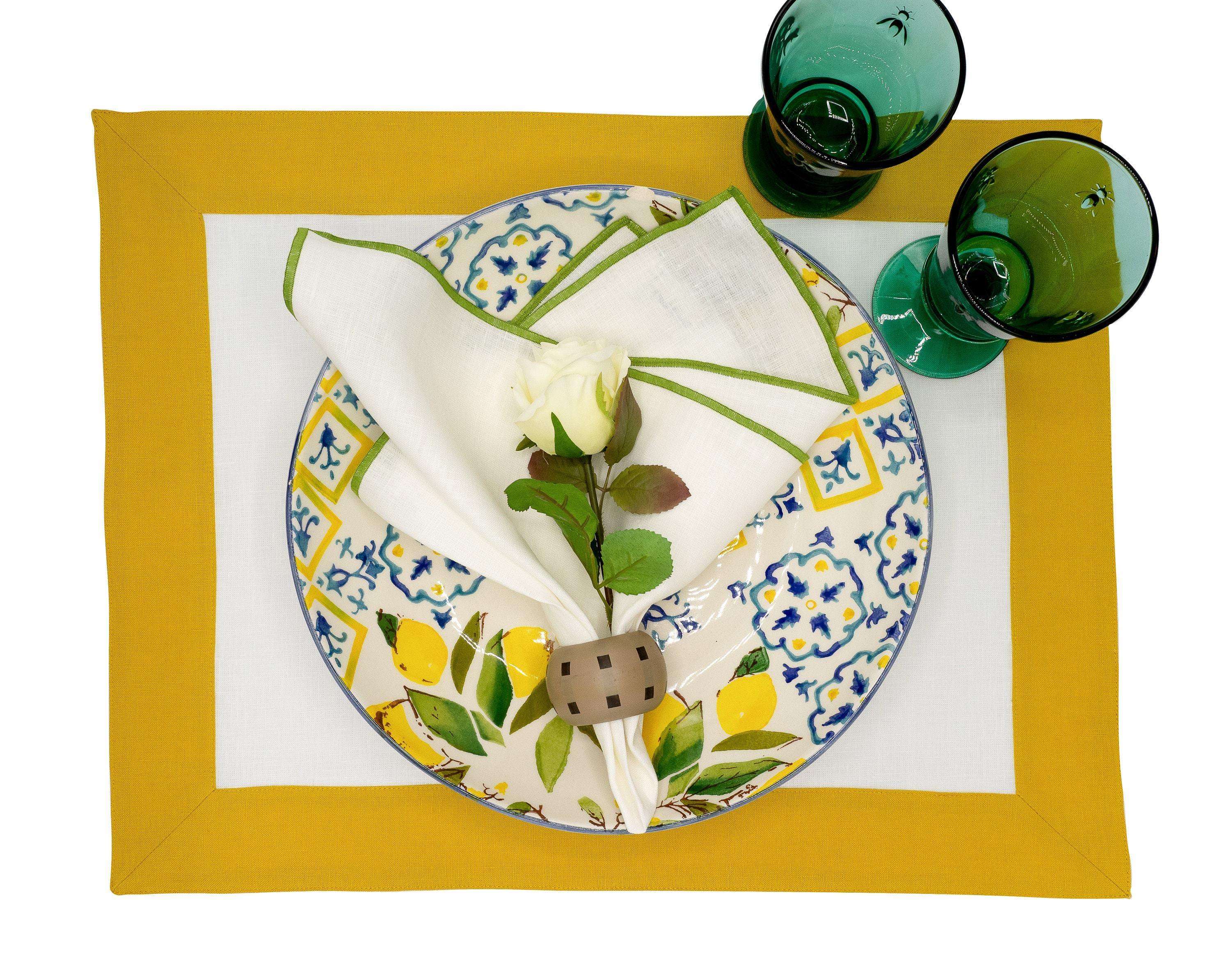 Set of 4 linen placemats with mustard borders, handmade to elevate your table setting for both casual and formal occasions.