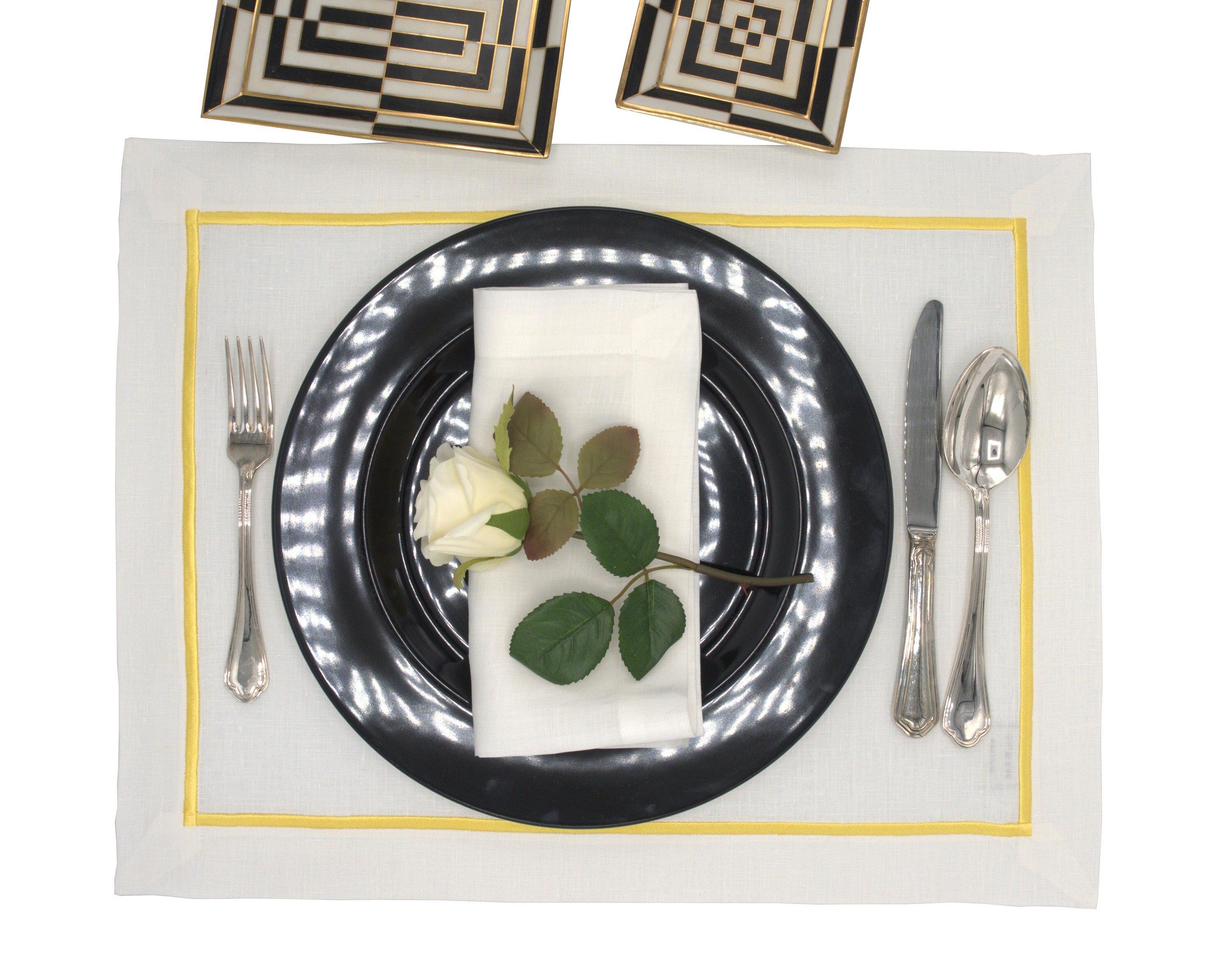 Durable and chic, these linen placemats with yellow borders provide a luxurious feel for your dining table, set of 4.